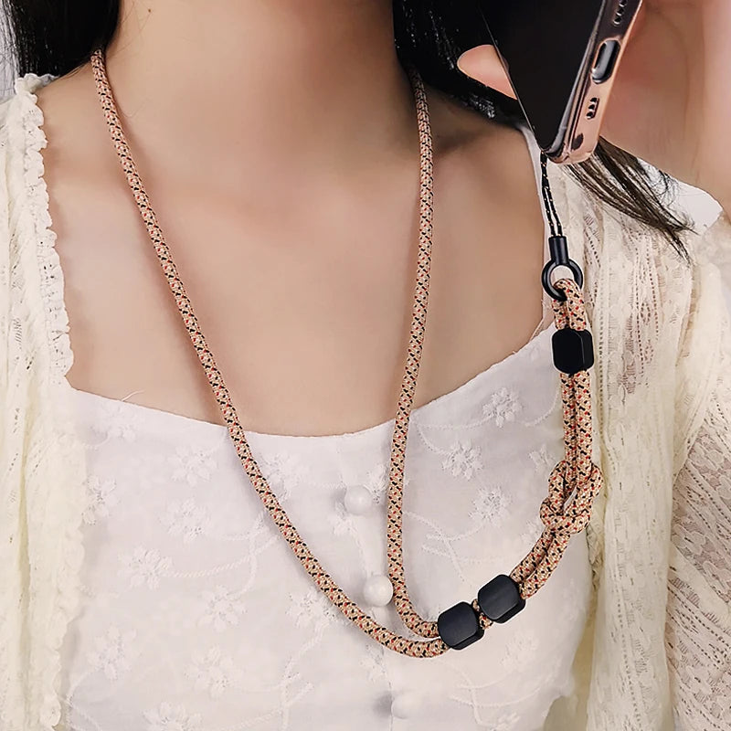 Keep your phone secure with this stylish hand-woven long neck lanyard. Features durable design, adjustable length, and dual-use function — perfect anti-lost pendant strap for all smartphones.