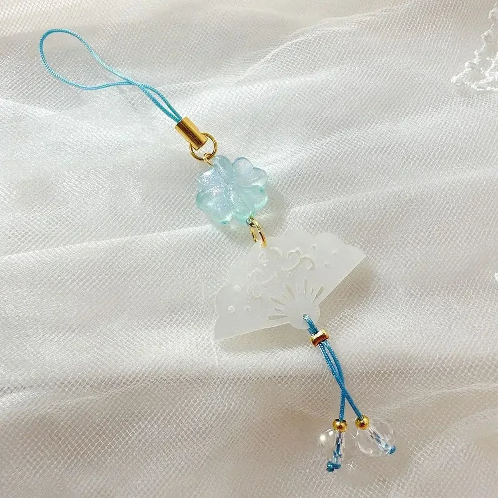 Handmade Chinese-style butterfly phone charm with calligraphy design. Elegant trinket strap and anti-lost cord for phones or bags.