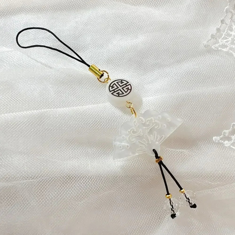 Handmade Chinese-style butterfly phone charm with calligraphy design. Elegant trinket strap and anti-lost cord for phones or bags.