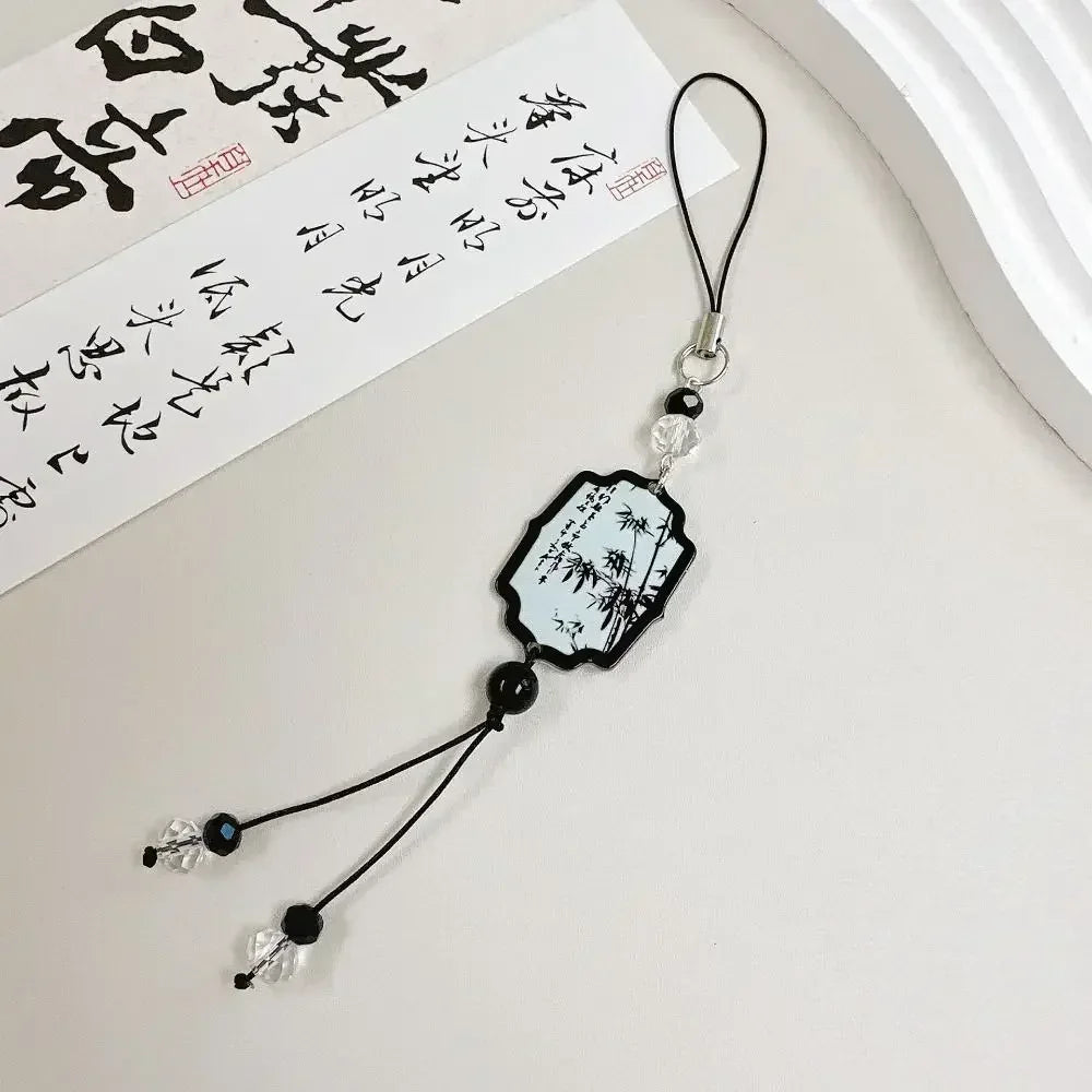 Handmade Chinese-style butterfly phone charm with calligraphy design. Elegant trinket strap and anti-lost cord for phones or bags.