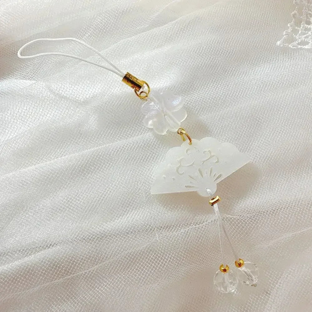 Handmade Chinese-style butterfly phone charm with calligraphy design. Elegant trinket strap and anti-lost cord for phones or bags.