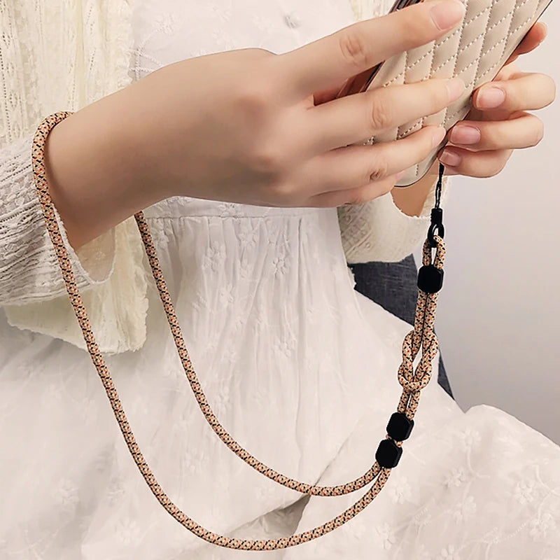 Keep your phone secure with this stylish hand-woven long neck lanyard. Features durable design, adjustable length, and dual-use function — perfect anti-lost pendant strap for all smartphones.